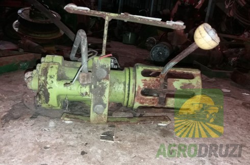 Б/В Помпа гідравліки John Deere в зборі (шків, патрубок)