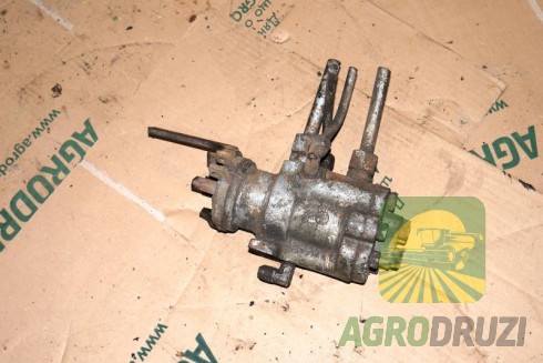 Б/В Помпа гідравліки John Deere в зборі (шків, патрубок)